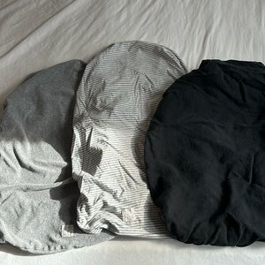 Three changing pad covers